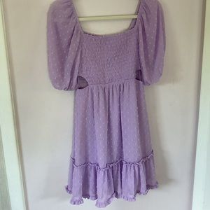 Super cute purple dress size extra small, super stretchy can fit up to a medium